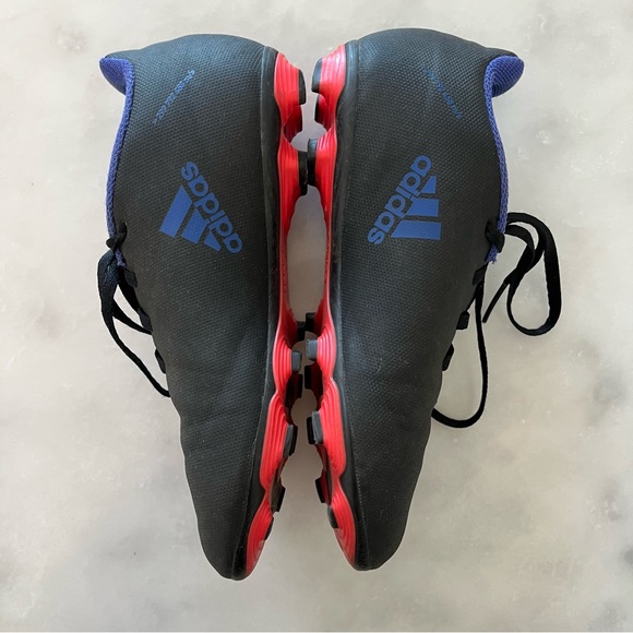 Adidas Unisex -Child X Speedflow. 4 Flexible Ground Soccer Cleat. Black, blue. 4 - Picture 2 of 8